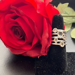 Pretty Silver Tone Multi Band Ring With Different Shape Clear Stones.